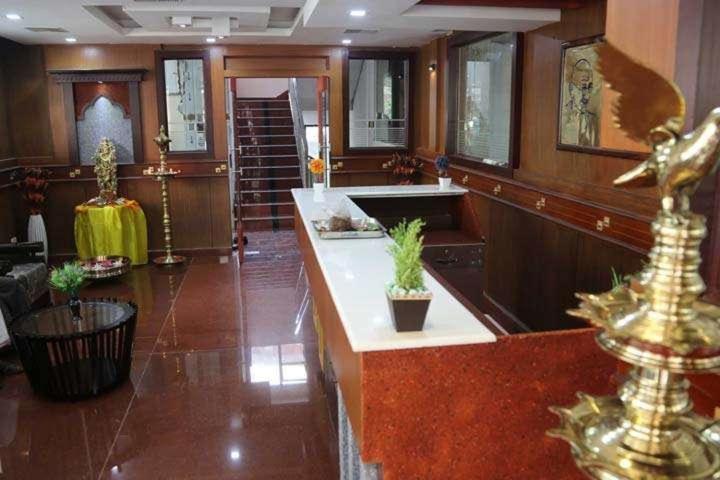 Отель Devanganam Residency Гуруваюр Экстерьер фото