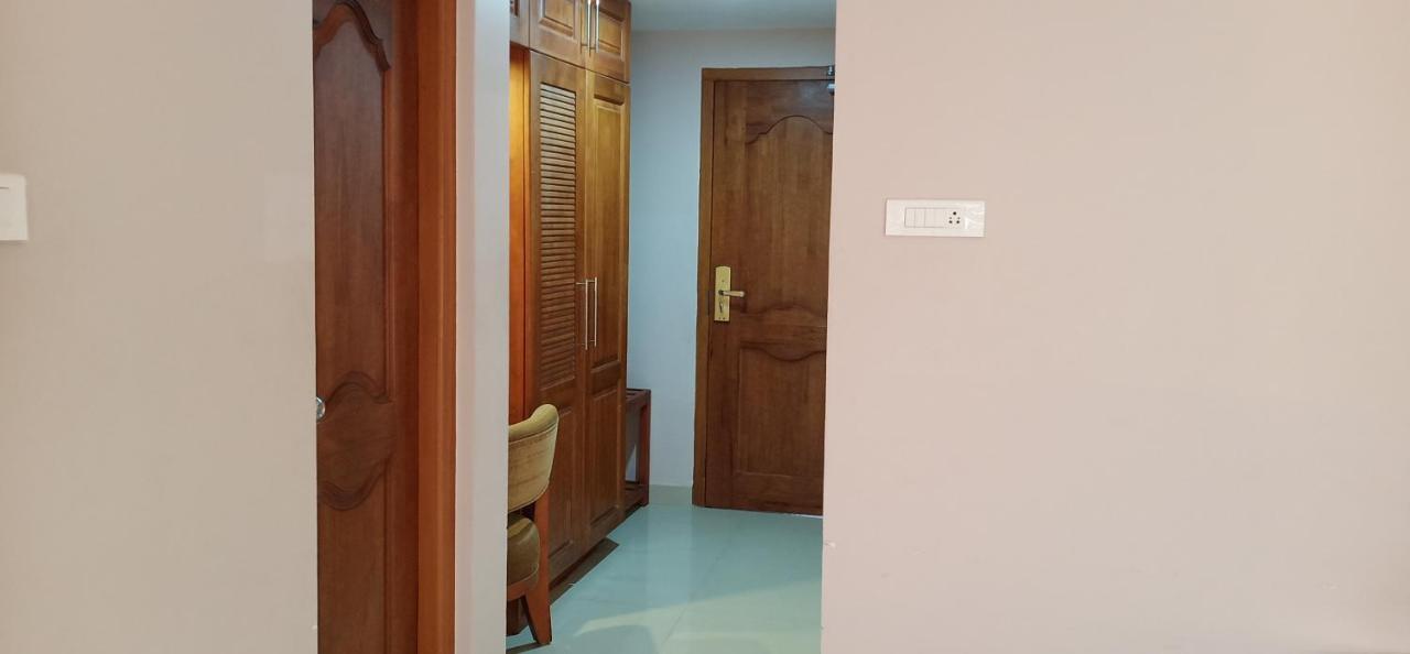 Отель Devanganam Residency Гуруваюр Экстерьер фото